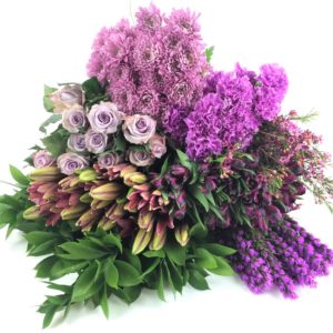 Lavender colored flowers on table