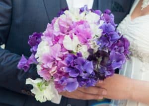 bridal bouquet of white pink and purple bouquets