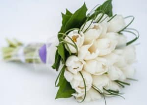 bridal bouquet made up of white tulips
