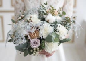 winter bridal bouquet of white flowers and greenery