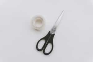scissors and tape on a white background. office equipment for work