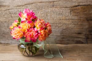 Wild roses bouquet in a glass vase