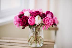 Beautiful bouquet of flowers: white, pink and burgundy peonies