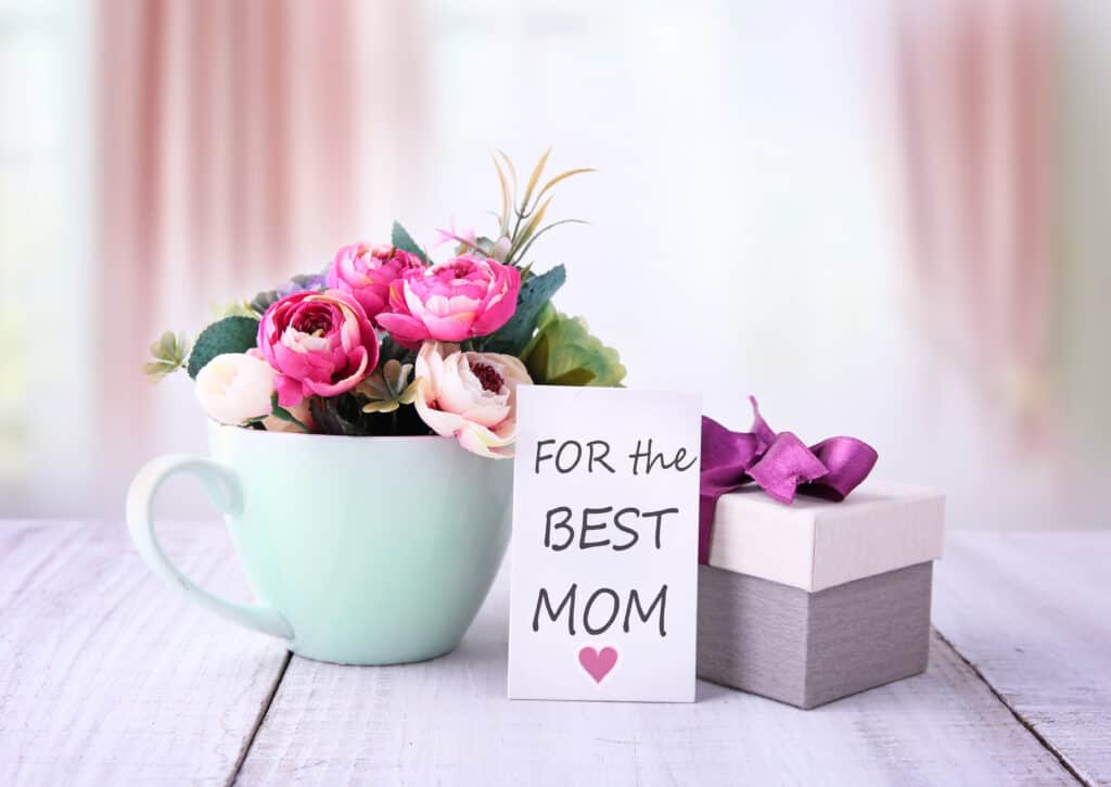 Mother's Day flowers, card, and wrapped present