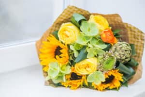 Fall bouquet with sunflowers and yellow roses
