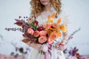 Woman holding luxe bouquet of flowers