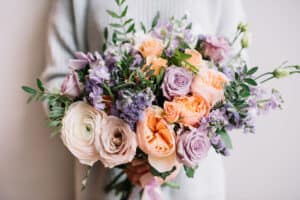 Peach and purple bouquet of flowers