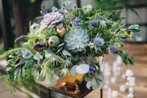 Meadow-like flower bouquet with succulent