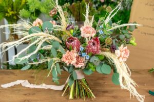 Loose bouquet with protea and pampas grass