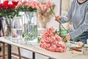 Woman working with roses
