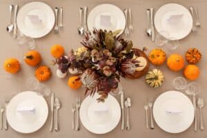 Centerpiece from above with protea and pumpkins