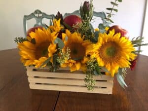 Centerpiece with sunflowers and apples