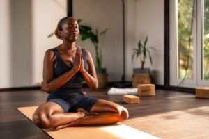 Woman doing yoga with plants