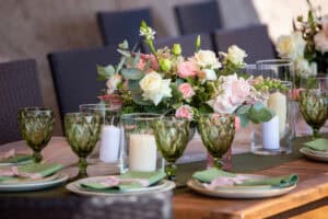 Wildflower inspired centerpiece with green glassware