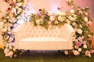 Sofa with floral installation