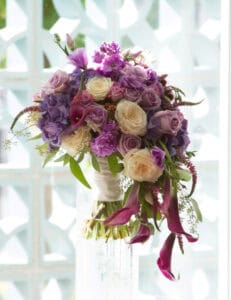 Purple and white cascading bridal bouquet