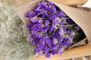 Purple statice in brown paper